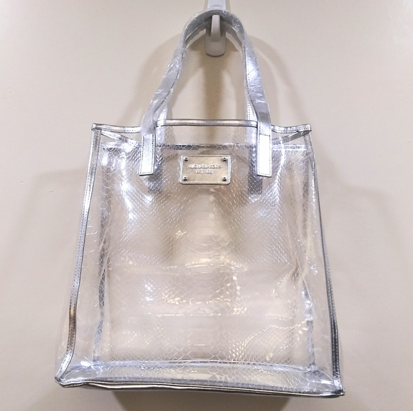 Michael Kors Handbags - NWOT Michael Kors Clear Snake Silver Tote Bag